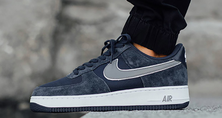 dark blue and white air force ones