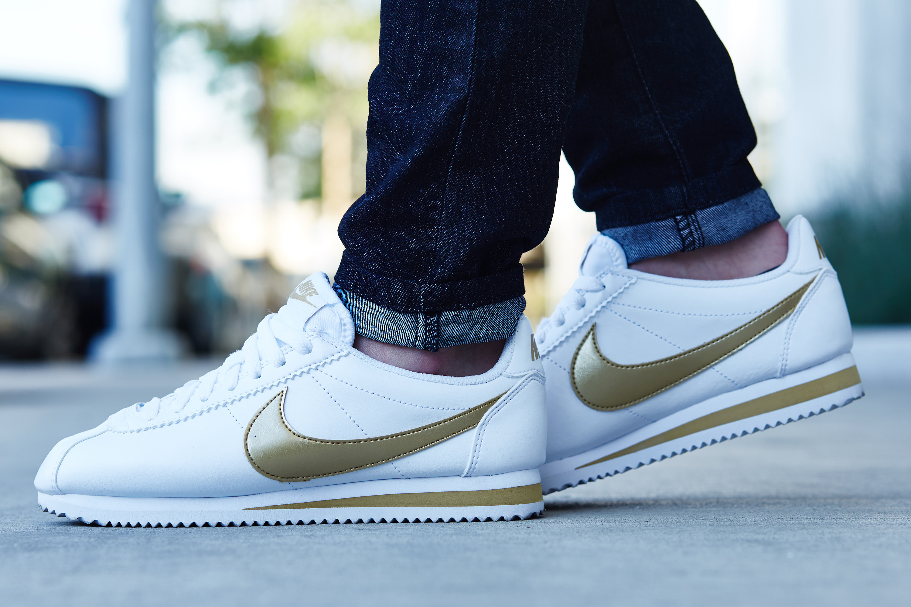 nike cortez black and gold