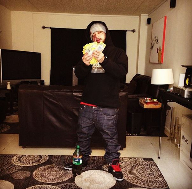 A$AP Yams with foreign money in the Air Jordan 4 "Laser"