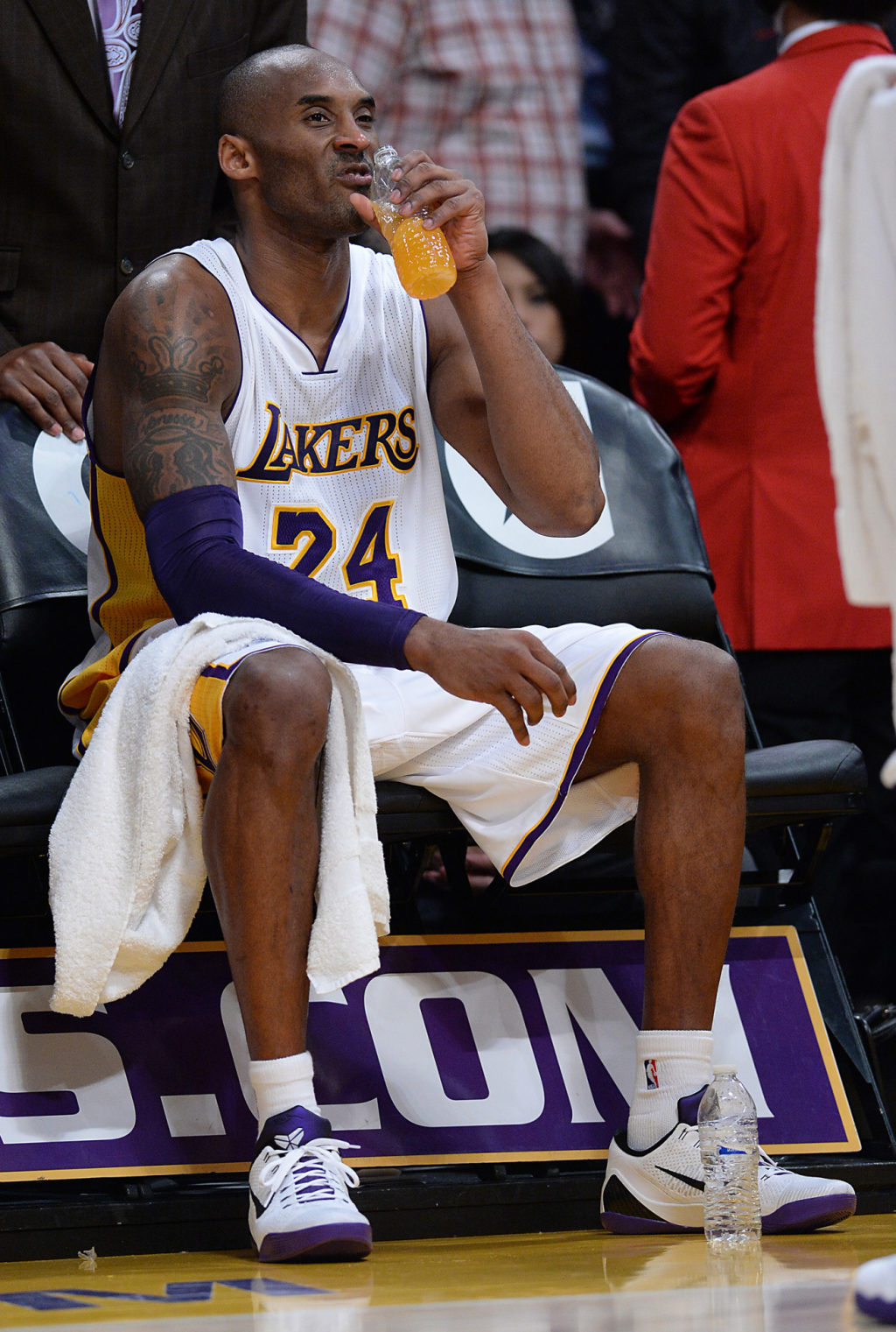 Kobe Bryant wearing the nike ct2300 001 air force 1 07 lv8 3 mens lifestyle shoe black white EM