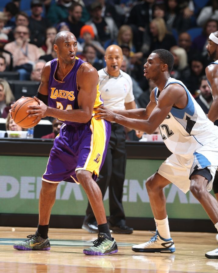 Kobe Bryant posting up in the "Mamba Moment" Saucony Jazz Court Sneakers Elite iD