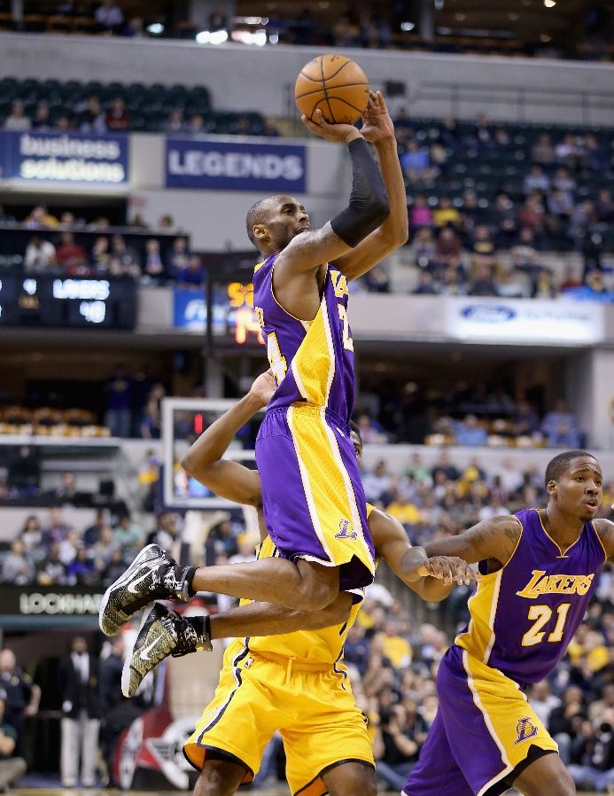 Kobe Bryant shooting in the Saucony Jazz Court Sneakers Elite "Precision"