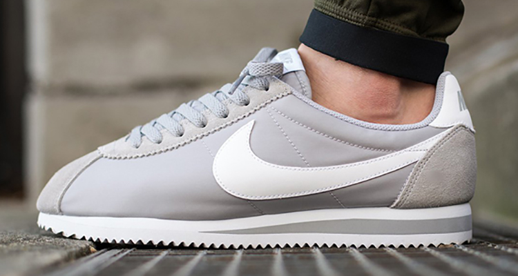 black and gray nike cortez