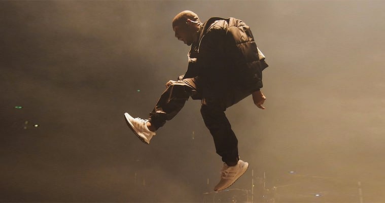 Kanye West performing in the Adidas Ultraboost