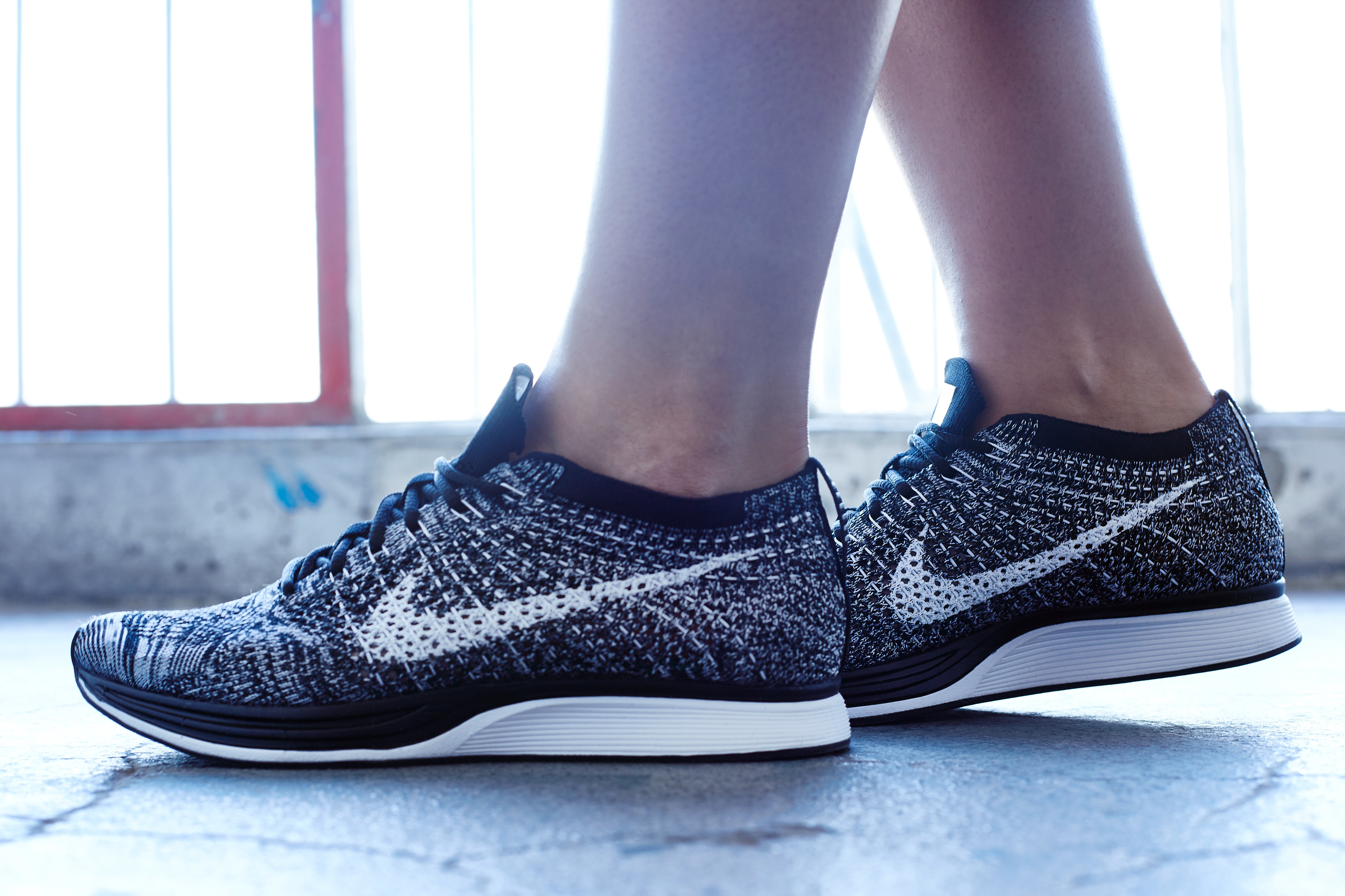 flyknit racer on feet