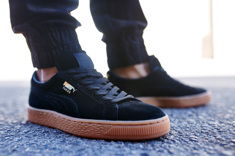 puma suede black on feet