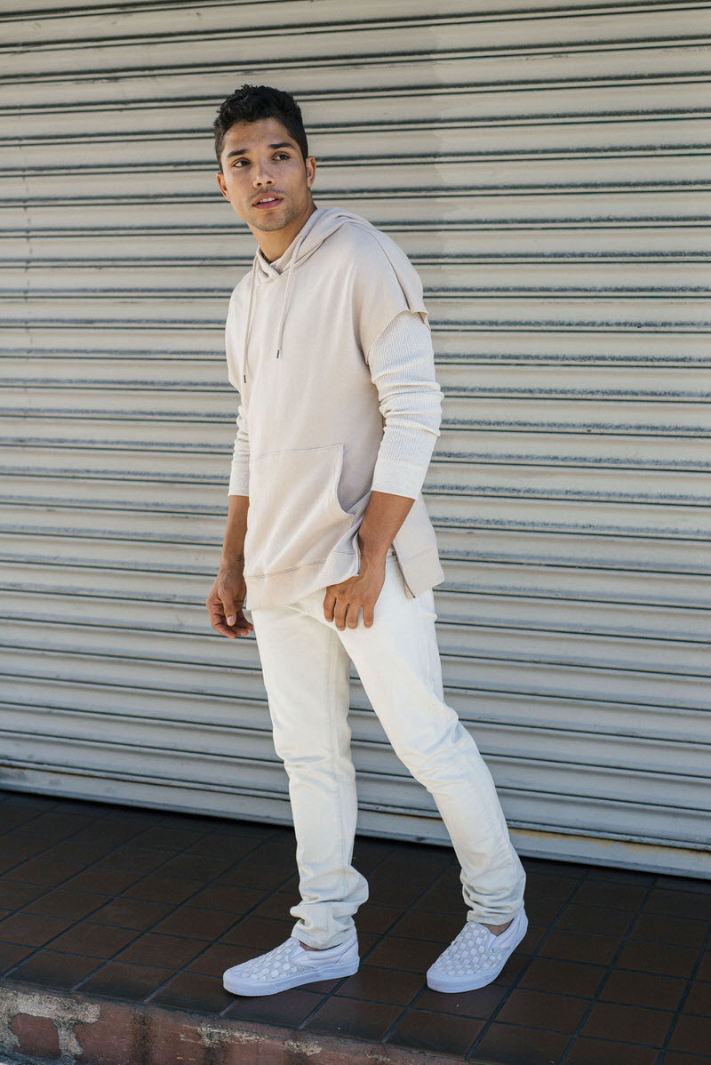 all white slip on vans on feet