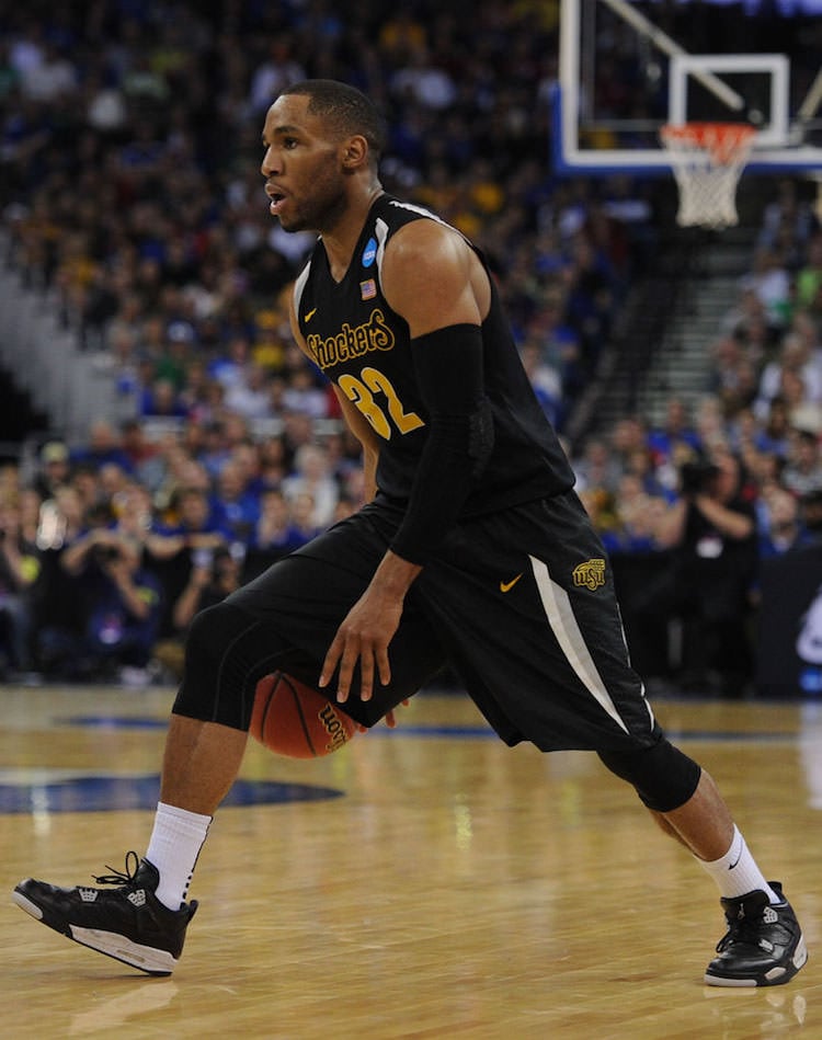 Mar 22, 2015; Omaha, NE, USA; Wichita State Shockers guard Tekele Cotton (32) dribbles against the Kansas Jayhawks in the third round of the 2015 NCAA Tournament at CenturyLink Center. Wichita State defeated Kansas 78-65. Mandatory Credit: Steven Branscombe-USA TODAY Sports