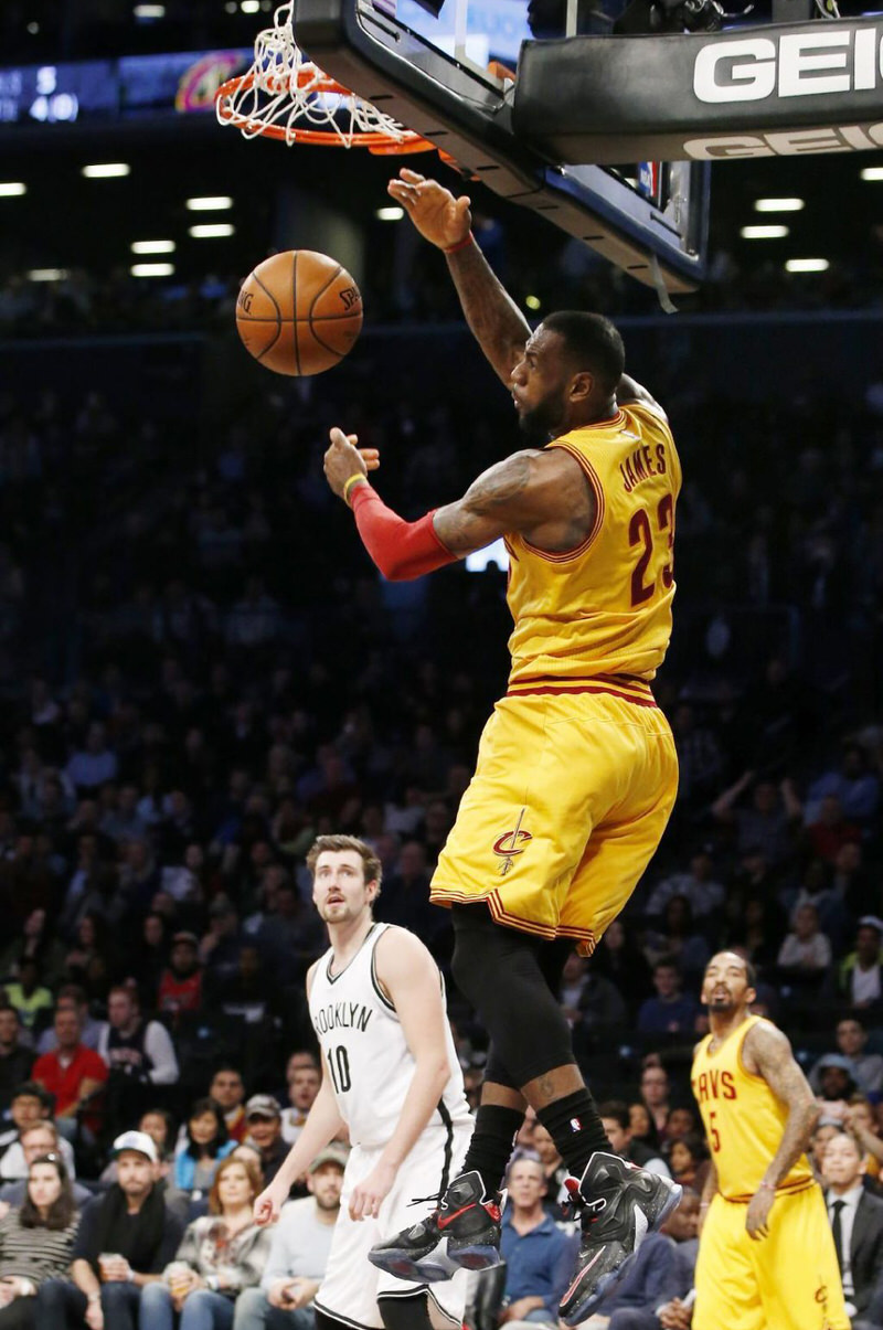 LeBron James dunking in a Nike LeBron 13 PE