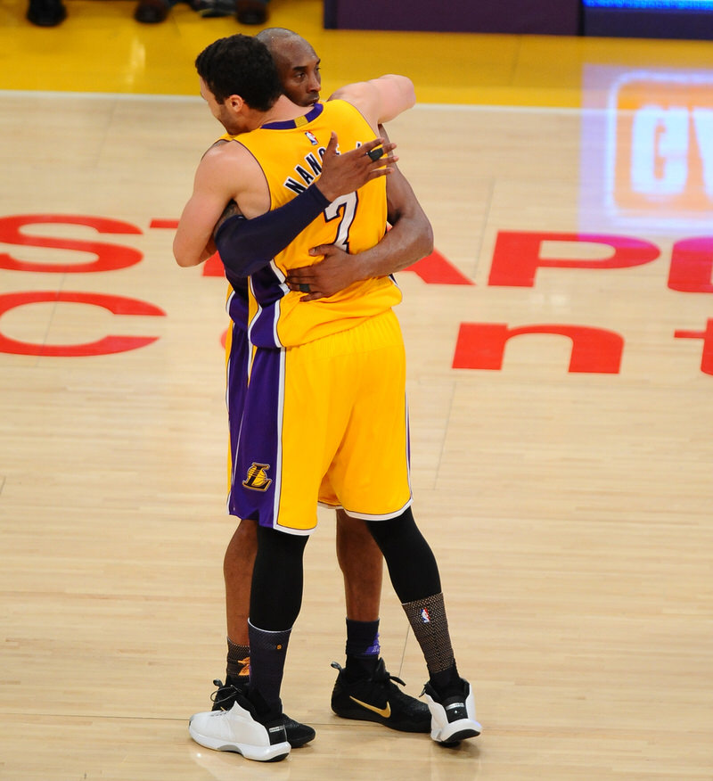 LOS ANGELES, CA - APRIL 13:  Kobe Bryant #24 and Larry Nance Jr. #7 of the Los Angeles Lakers hug after the game against the Utah Jazz on April 13, 2016 at Staples Center in Los Angeles, California. NOTE TO USER: User expressly acknowledges and agrees that, by downloading and/or using this Photograph, user is consenting to the terms and conditions of the Getty Images License Agreement. Mandatory Copyright Notice: Copyright 2016 NBAE (Photo by Juan Ocampo/NBAE via Getty Images)