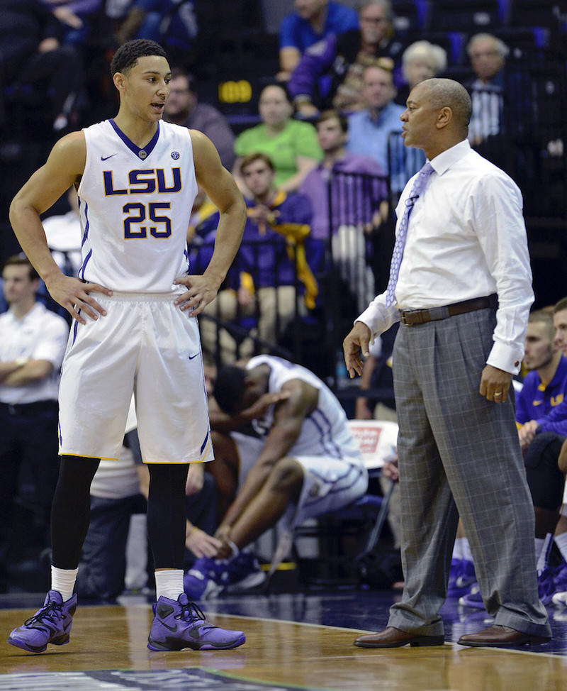 FILE - This Nov. 19, 2015 file photo shows LSU head coach Johnny Jones, right, speaking with LSU forward Ben Simmons (25) in the second half of an NCAA college basketball game in Baton Rouge, La. Despite having the projected No. 1 NBA draft pick in Simmons on the roster, Jones and the Tigers struggled down the stretch to finish with a 19-14 record and no appearance in the NCAA Tournament. Jones expected to be anywhere but conducting a season-ending news conference on the LSU campus Tuesday, March 15, 2016. (AP Photo/Bill Feig, file)