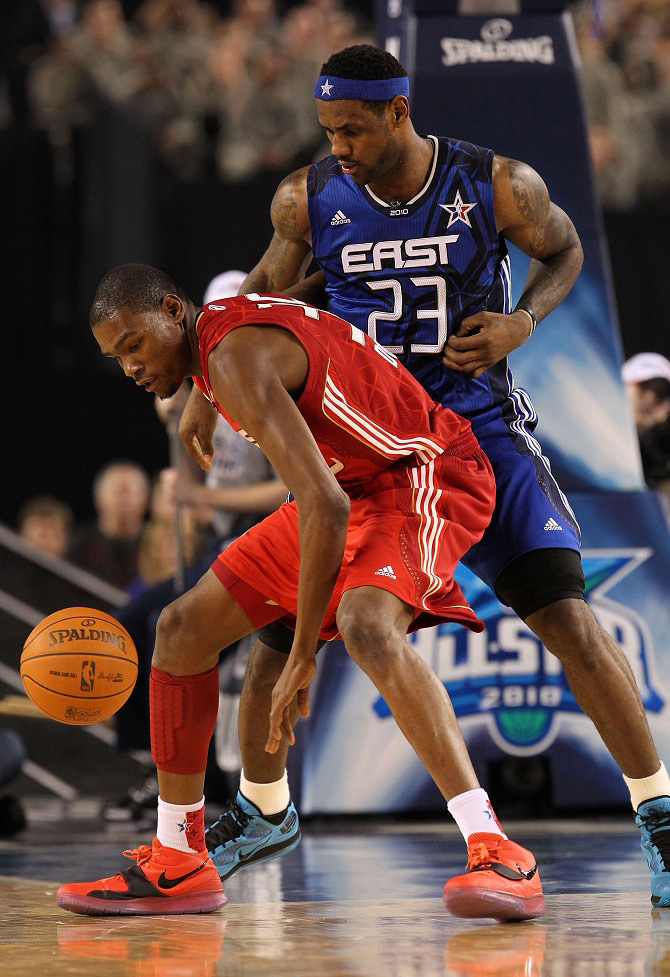 ARLINGTON, TX - FEBRUARY 14: Kevin Durant #35 of the Western Conference dribbles against LeBron James #23 of the Eastern Conference during the first half of the NBA All-Star Game, part of 2010 NBA All-Star Weekend at Cowboys Stadium on February 14, 2010 in Arlington, Texas. The Eastern Conference defeated the Western Conference 141-139 in regulation. NOTE TO USER: User expressly acknowledges and agrees that, by downloading and or using this photograph, User is consenting to the terms and conditions of the Getty Images License Agreement. (Photo by Ronald Martinez/Getty Images)
