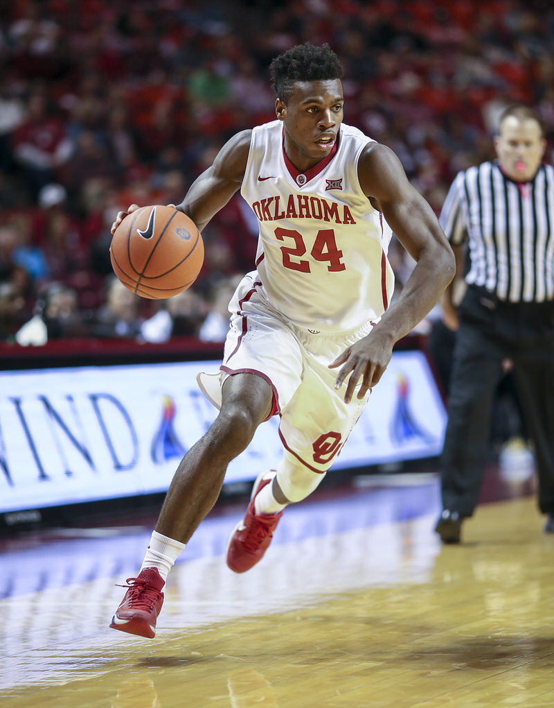 Senior guard Buddy Hield dribbles towards the basket during Tuesday night's game against Texas Tech at the Lloyd Noble Center.  Hield scored a game high 30 points during the Sooners' 91-67 victory over the Red Raiders.