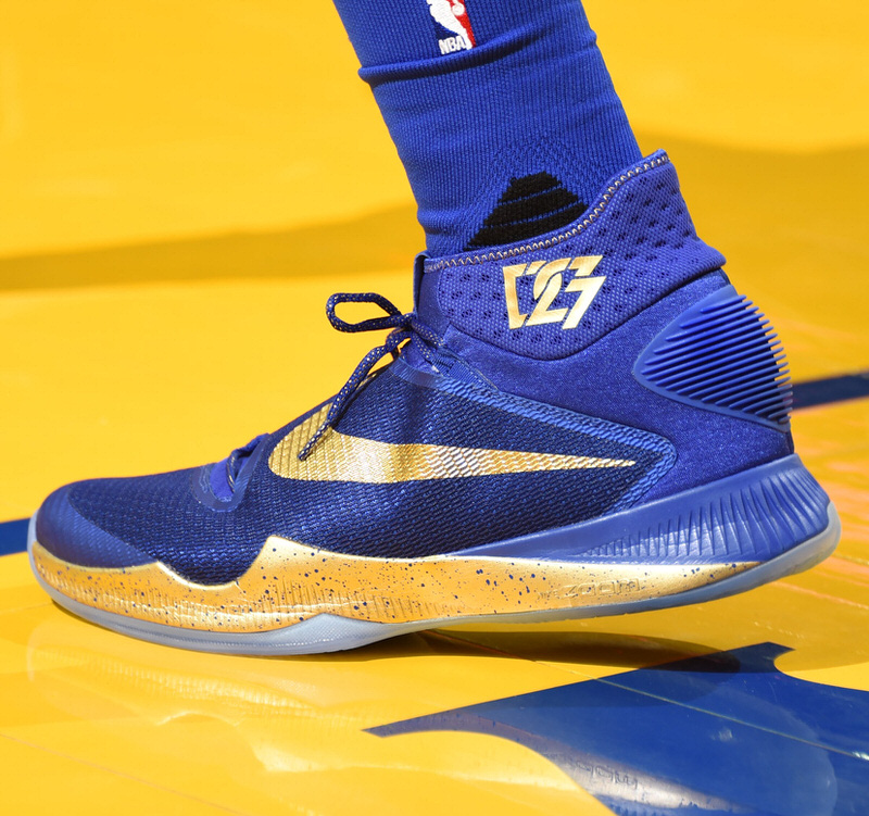 OAKLAND, CA - JUNE 5: The sneakers of Draymond Green #23 of the Golden State Warriors during the game against the Cleveland Cavaliers in Game Two of the 2016 NBA Finals on June 5, 2016 at ORACLE Arena in Oakland, California. NOTE TO USER: User expressly acknowledges and agrees that, by downloading and/or using this Photograph, user is consenting to the terms and conditions of the Getty Images License Agreement. Mandatory Copyright Notice: Copyright 2016 NBAE (Photo by Andrew D. Bernstein/NBAE via Getty Images)