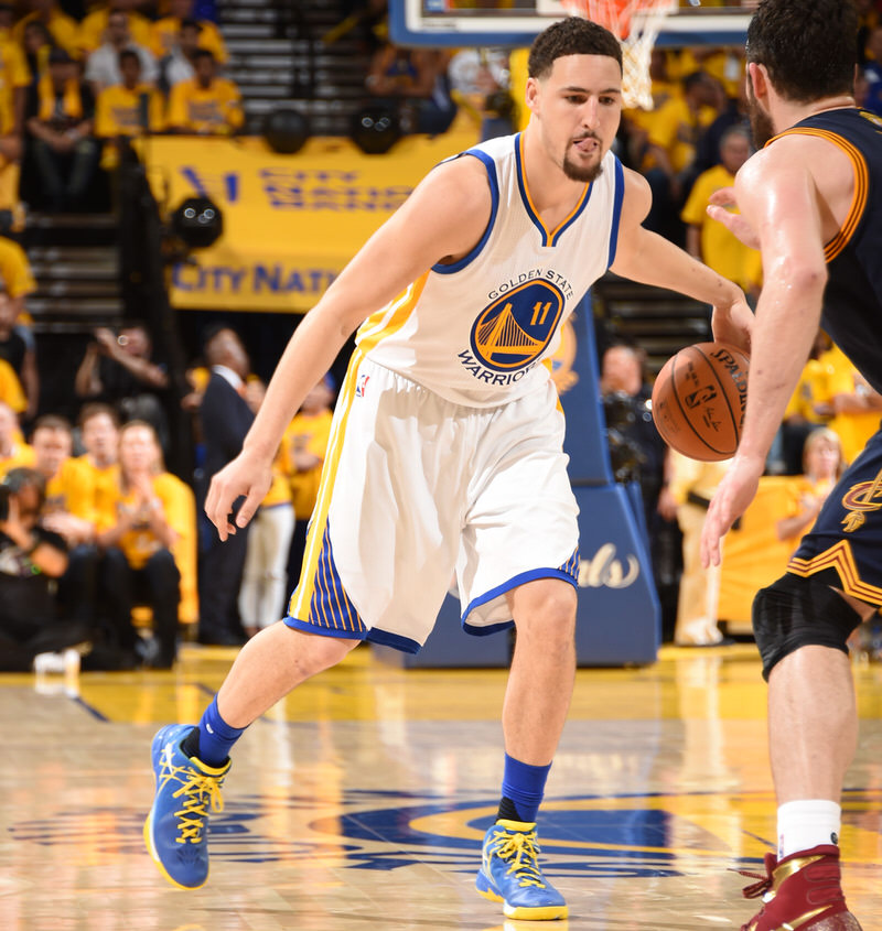 OAKLAND, CA - JUNE 2:  Klay Thompson #11 of the Golden State Warriors dribbles the ball against the Cleveland Cavaliers in Game One of the 2016 NBA Finals on June 2, 2016 at Oracle Arena in Oakland, California. NOTE TO USER: User expressly acknowledges and agrees that, by downloading and or using this photograph, user is consenting to the terms and conditions of Getty Images License Agreement. Mandatory Copyright Notice: Copyright 2016 NBAE (Photo by Andrew D. Bernstein/NBAE via Getty Images)