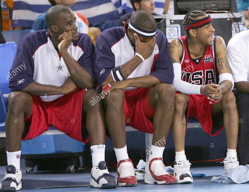 epa000251985 US basketball players Emeka Okafor (L), Amare Stoudemire (C) and Allan Iverson (R) react on the bench as their team is defeated by Puerto Rico in a preliminary group B Basketball match of the Athens 2004 Olympic Games, Sunday 15 August 2004. The US team lost 73-92. epa/ana/dpa Akis Mikoniatis EPA/Akis Mikoniatis