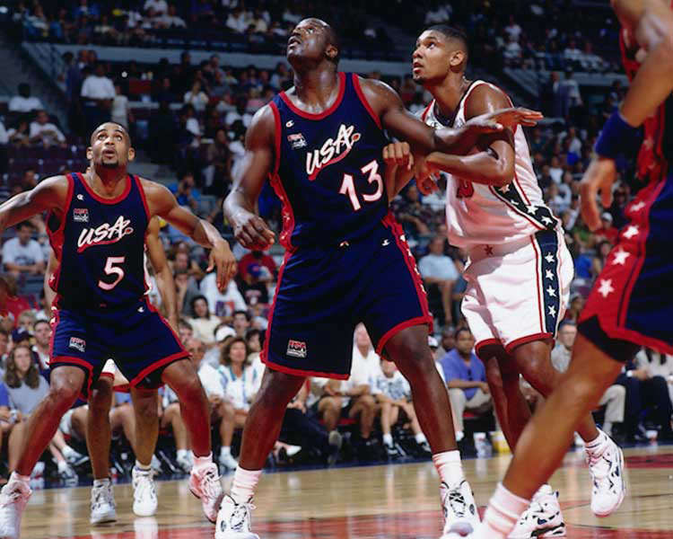 ATLANTA, GA - 1996: Shaquille O'Neal #13 The U.S. Mens Basketball Team battles for position against Tim Duncan #13 as they play during a scrimage circa 1996 during the 1996 Summer Olympics at the Georgia Dome in Atlanta, GA. NOTE TO USER: User expressly acknowledges and agrees that, by downloading and or using this photograph, user is consenting to the terms and conditions of Getty Images License Agreement. Mandatory Copyright Notice: Copyright 1996 NBAE (Photo by NBA Photos/NBAE via Getty Images)