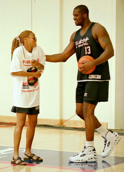 16 Jul 1996: Nikki McCray of the U.S. Women''s Baketball Team and Shaquille O''Neal of the Men''s U.S. Team share a laugh during team practices at the Disney Institute in Walt Disney World in Orlando, Florida.