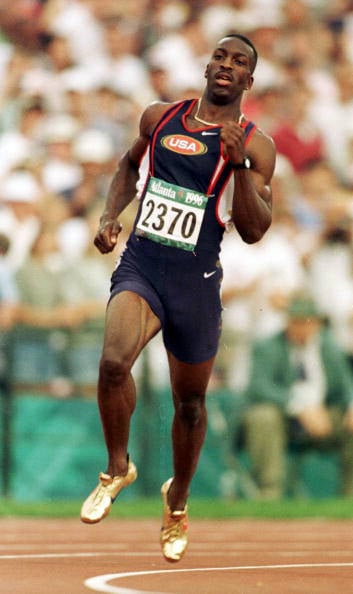 26 Jul 1996: Michael Johnson of the USA rounds the final bend of the men's 400m qualifying round at Olympic Stadium at the 1996 Centennial Olympic Games in Atlanta, Georgia. Johnson finished first. Mandatory Credit: Mike Hewitt /Allsport