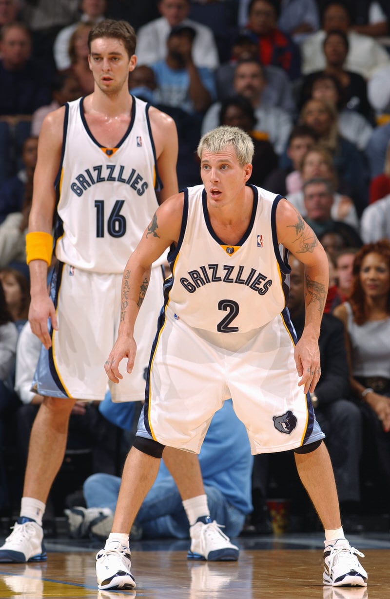 MEMPHIS - NOVEMBER 10: Jason Williams #2 and Pau Gasol #16 of the Memphis Grizzlies stands on the court during the game with the Los Angeles Lakers at the FedExForum on November 10, 2004 in Memphis, Tennessee. The Grizzlies won 110-87. NOTE TO USER: User expressly acknowledges and agrees that, by downloading and/or using this Photograph, user is consenting to the terms and conditions of the Getty Images License Agreement. Mandatory Copyright Notice: Copyright 2004 NBAE (Photo by Joe Murphy/NBAE via Getty Images)