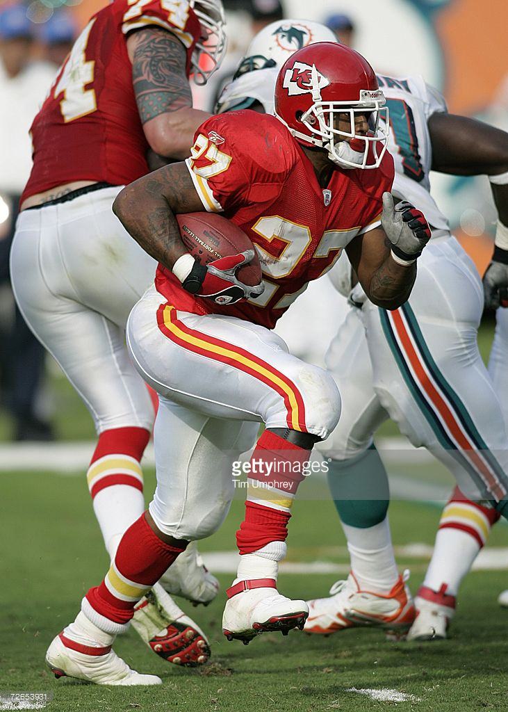 Larry Johnson in the Reebok S. Carter Mid Cleat (photo by via Getty Images)