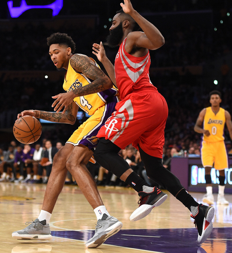 LOS ANGELES, CA - OCTOBER 26:  Brandon Ingram #14 of the Los Angeles Lakers backs in on James Harden #13 of the Houston Rockets during a 120-114 season opening Laker win at Staples Center on October 26, 2016 in Los Angeles, California.  NOTE TO USER: User expressly acknowledges and agrees that, by downloading and or using this photograph, User is consenting to the terms and conditions of the Getty Images License Agreement.  (Photo by Harry How/Getty Images)