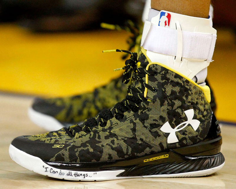 Jan 9, 2015; Oakland, CA, USA; Golden State Warriors guard Stephen Curry (30) wears his new signature shoe by Under Armour, the "Curry One", during action against the Cleveland Cavaliers in the fourth quarter at Oracle Arena. The Warriors defeated the Cavaliers 112-94. Mandatory Credit: Cary Edmondson-USA TODAY Sports