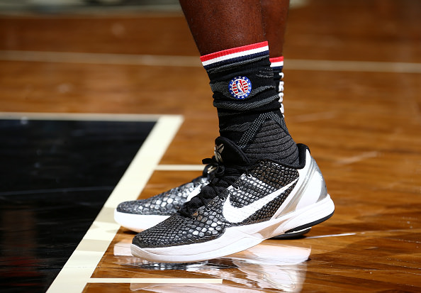 BROOKLYN, NY - NOVEMBER 4: The sneakers of Anthony Bennett #13 of the Brooklyn Nets who is wearing hoops for troops socks honoring members of the US armed forces and their families are seen during the game against the Charlotte Hornets on November 4, 2016 at Barclays Center in Brooklyn, New York. NOTE TO USER: User expressly acknowledges and agrees that, by downloading and or using this Photograph, user is consenting to the terms and conditions of the Getty Images License Agreement. Mandatory Copyright Notice: Copyright 2016 NBAE (Photo by Nathaniel S. Butler/NBAE via Getty Images)