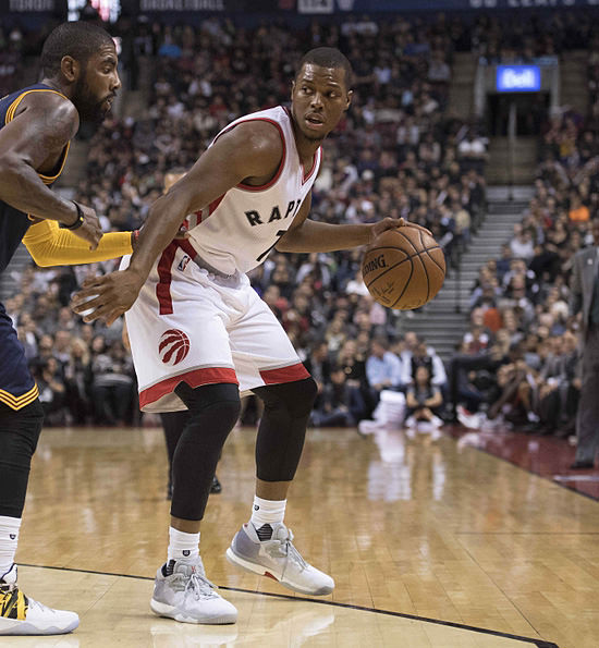 Oct 28, 2016; Toronto, Ontario, CAN; Toronto Raptors guard Kyle Lowry (7) dribbles the ball as Cleveland Cavaliers guard Kyrie Irving (2) defends during the third quarter at Air Canada Centre. The Cavaliers won 94-91. Mandatory Credit: Nick Turchiaro-USA TODAY Sports