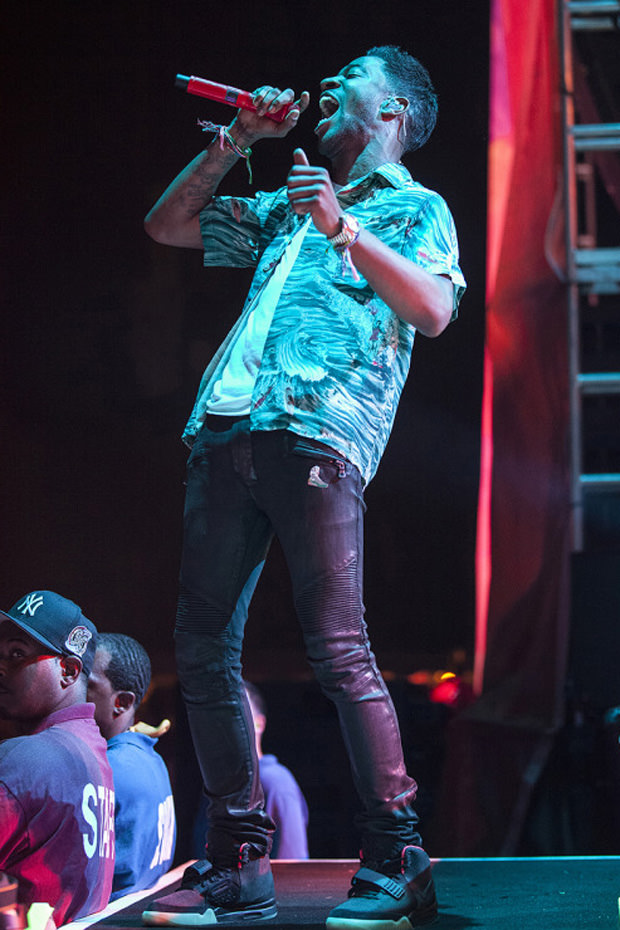 Kid Cudi in the Nike Air Yeezy 2 Black/Solar Red