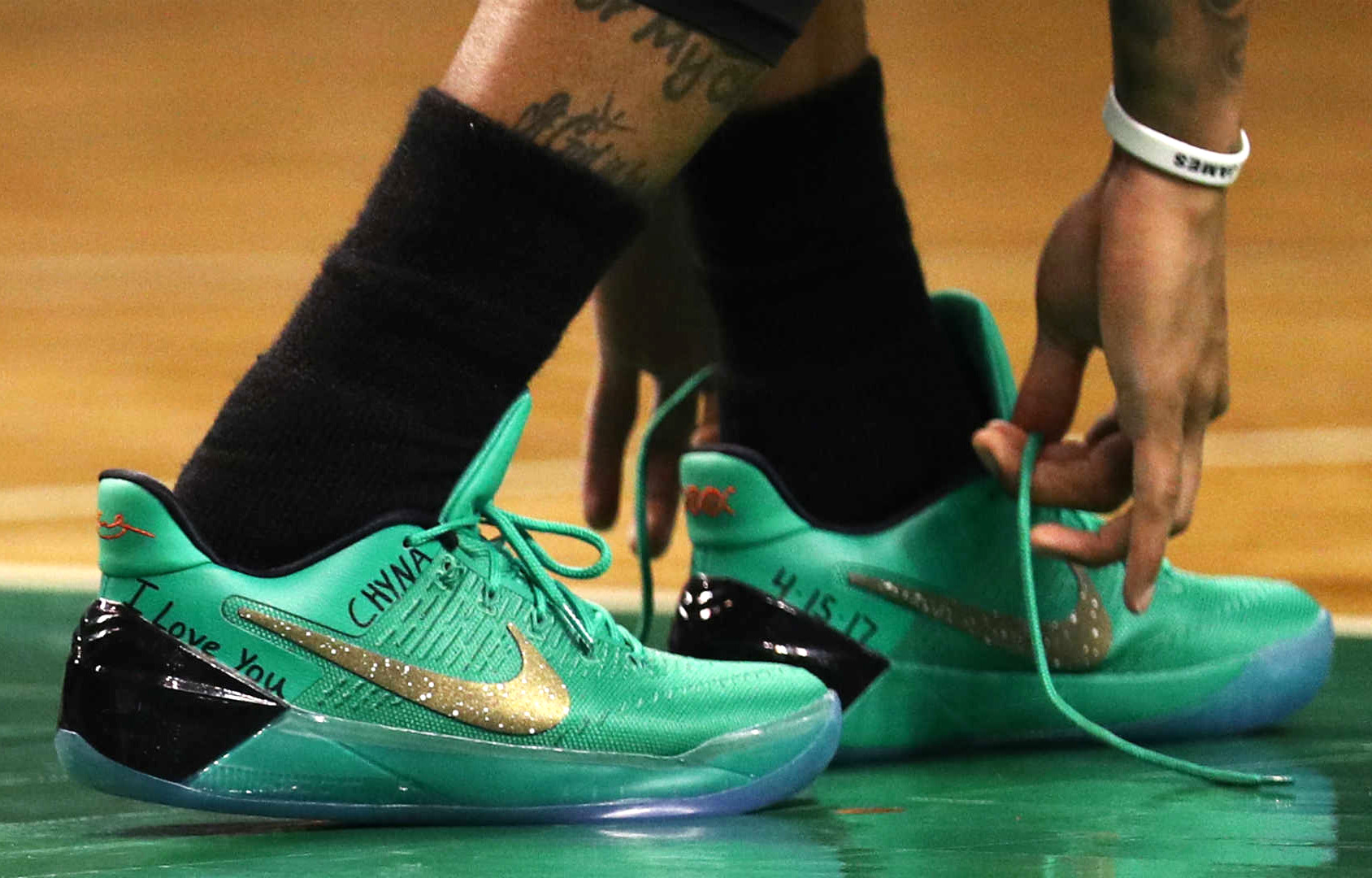 Kobe ad ankle sales support