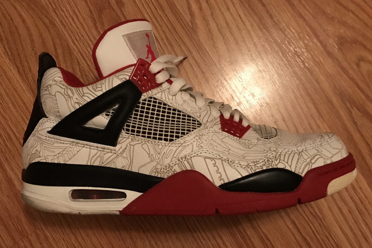 brown and red jordan 4