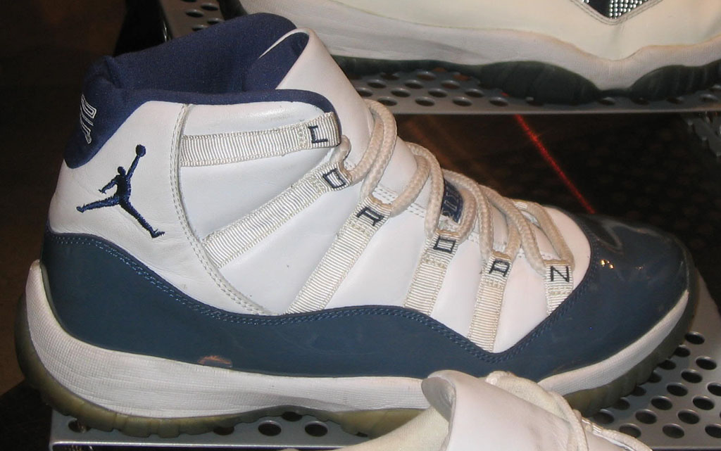 white and navy 11s