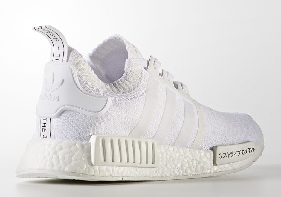 nmd with words on them