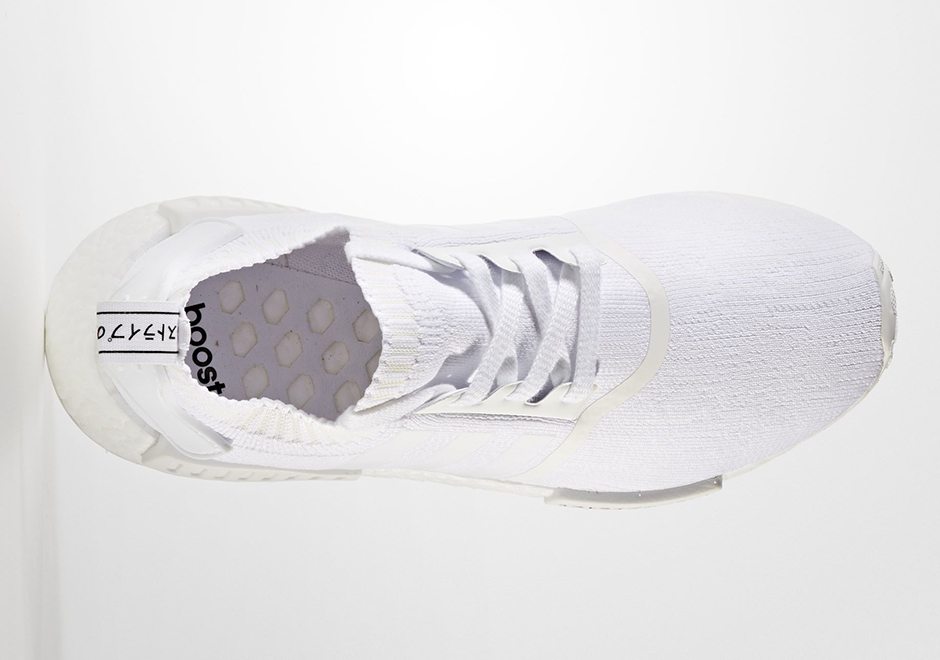 white nmds with japanese writing