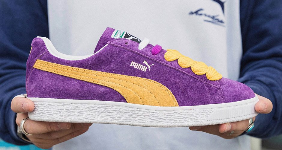 purple and gold pumas