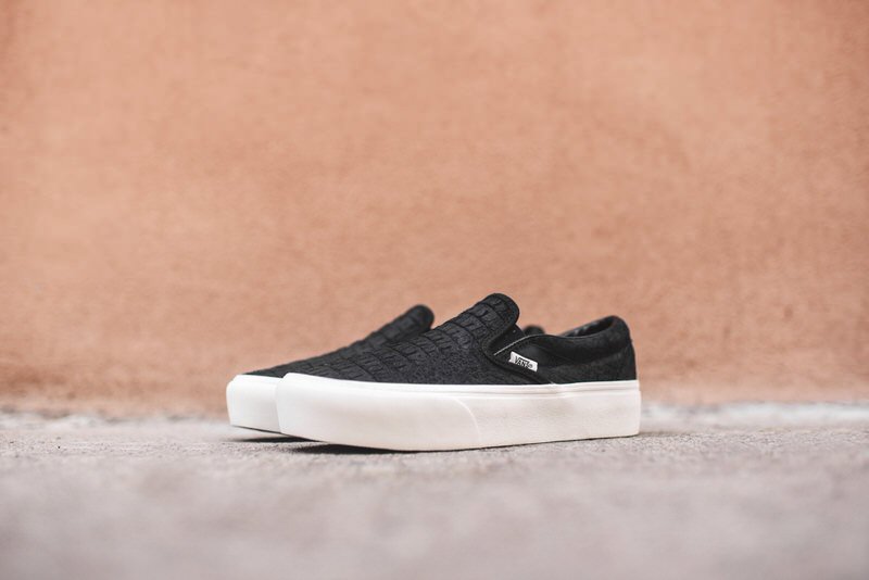 vans slip on platform trainers embossed black white