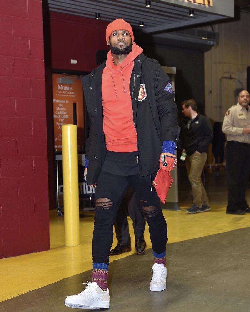 LBJ's winter status is locked in, finding subtle ways to pepper in vibrant color pops to his traditionally all black wardrobe.