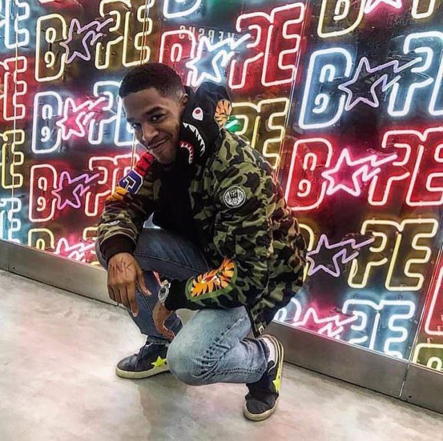 Kid Cudi's pairing of his Bape Shark hoodie and Golden Goose sneakers is a wicked awesome look that only a rockstar could replicate.