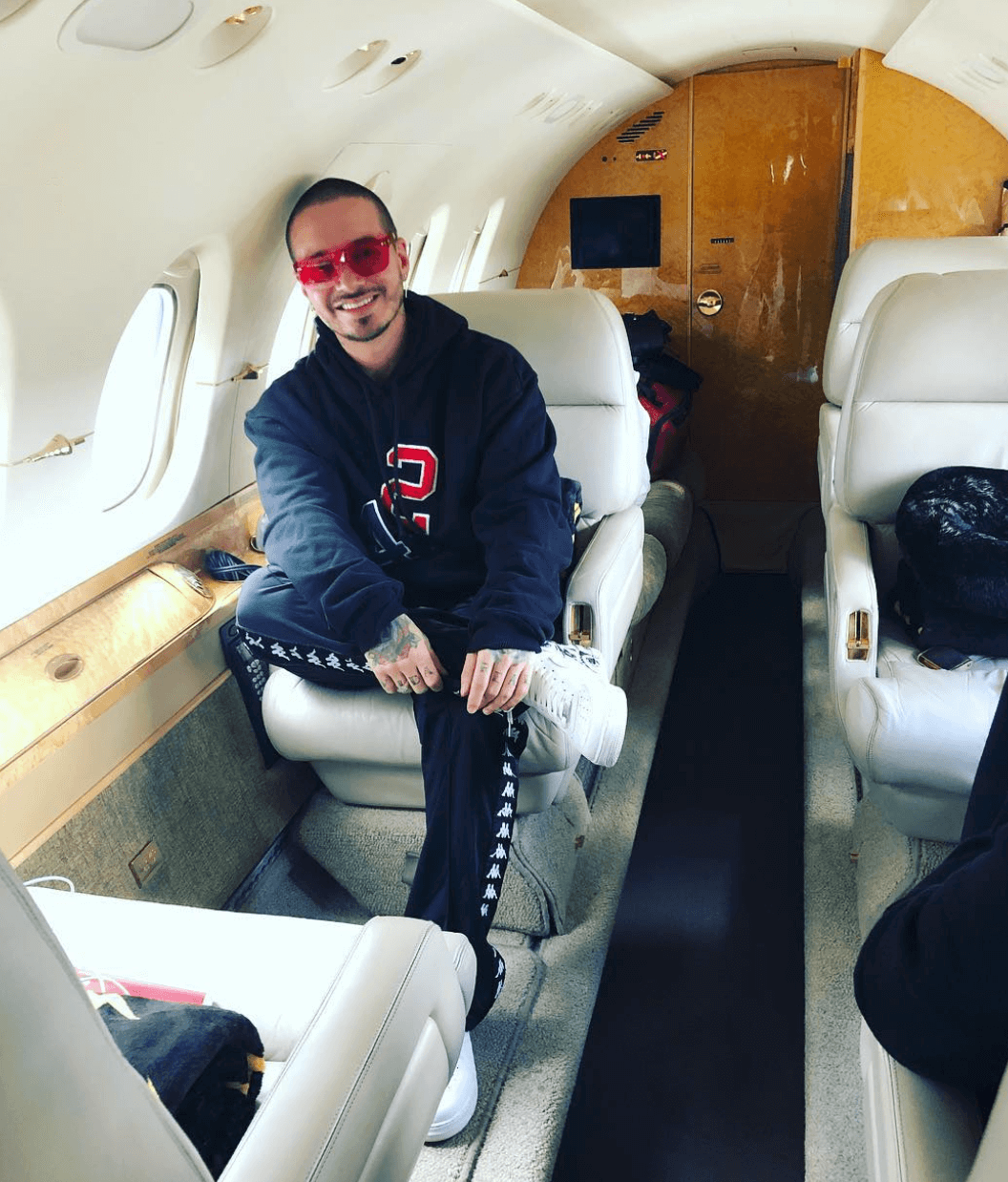 J Balvin pairs the Supreme x CDG x Nike Air Force 1 Low with other cozy classics.
