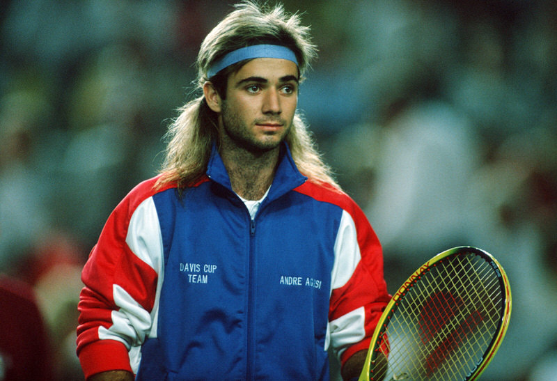 The mullet, the headband, the attitude, and that track jacket that's never been more in style.