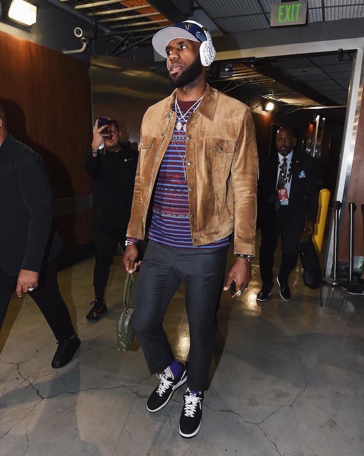 LeBron James goes in on the tailored men's suiting trend with the Supreme x COMME des GARCONS x Nike Air Force 1 Low.