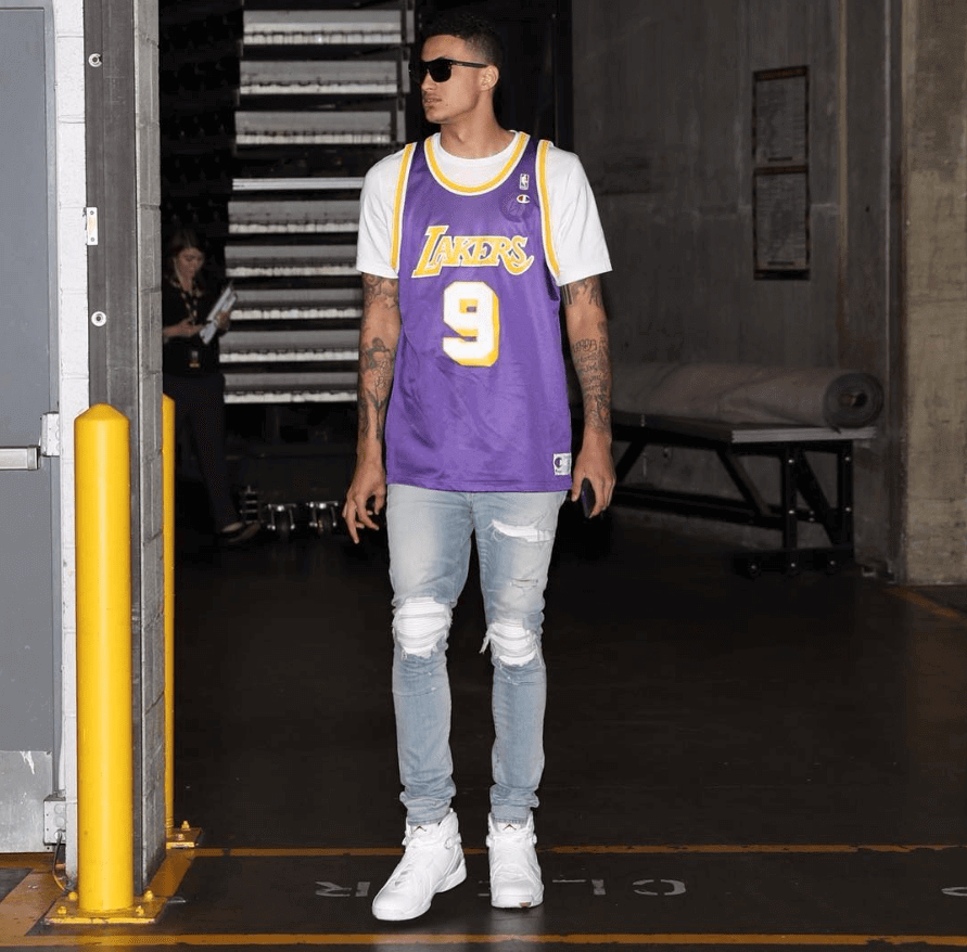 Inspired by different Jumpman icons. Kuzma wears OVO Jordan 8s, AMIRI MX-1 jeans, and a retro Lakers jersey.