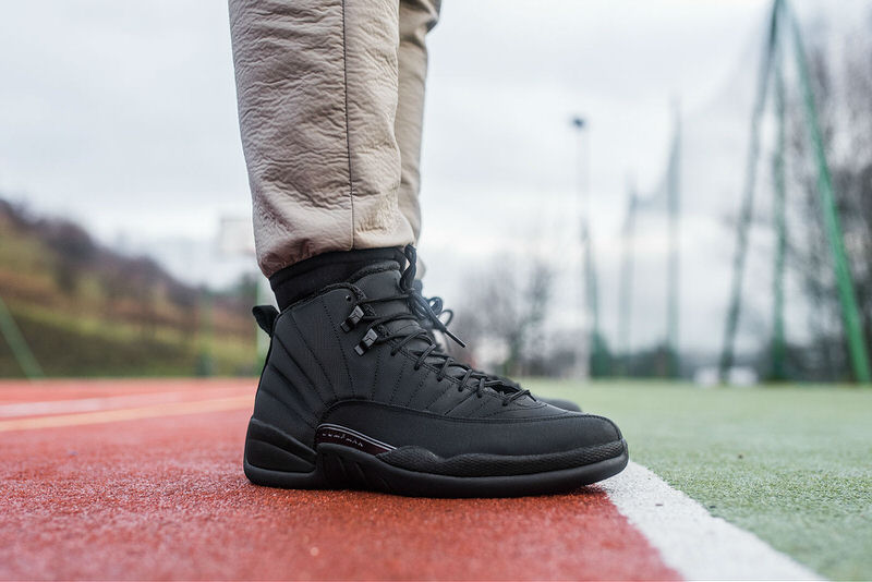 all black jordan 12's