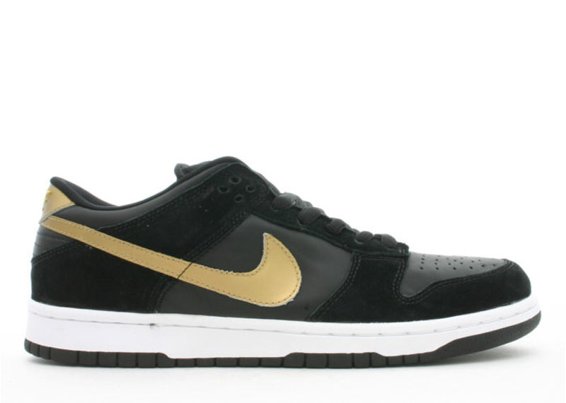 Nike sb dunk low black gold sale