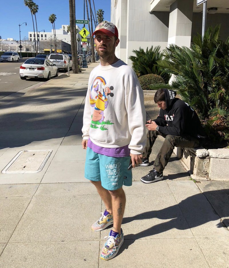 Mickey has been a long-time icon of streetwear, so Sean's move in matching his crewneck with vintage Stussy gear is right on.