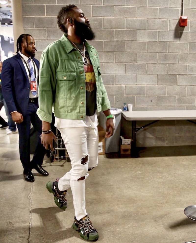 James Harden capitalizes on pastel tones and white ripped skinny jeans with a vintage inspired graphic tee.