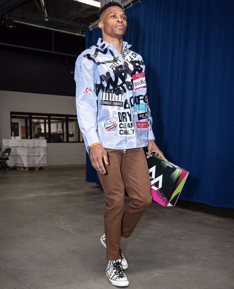 Russell Westbrook unites cropped trousers with Converse CT 70s.