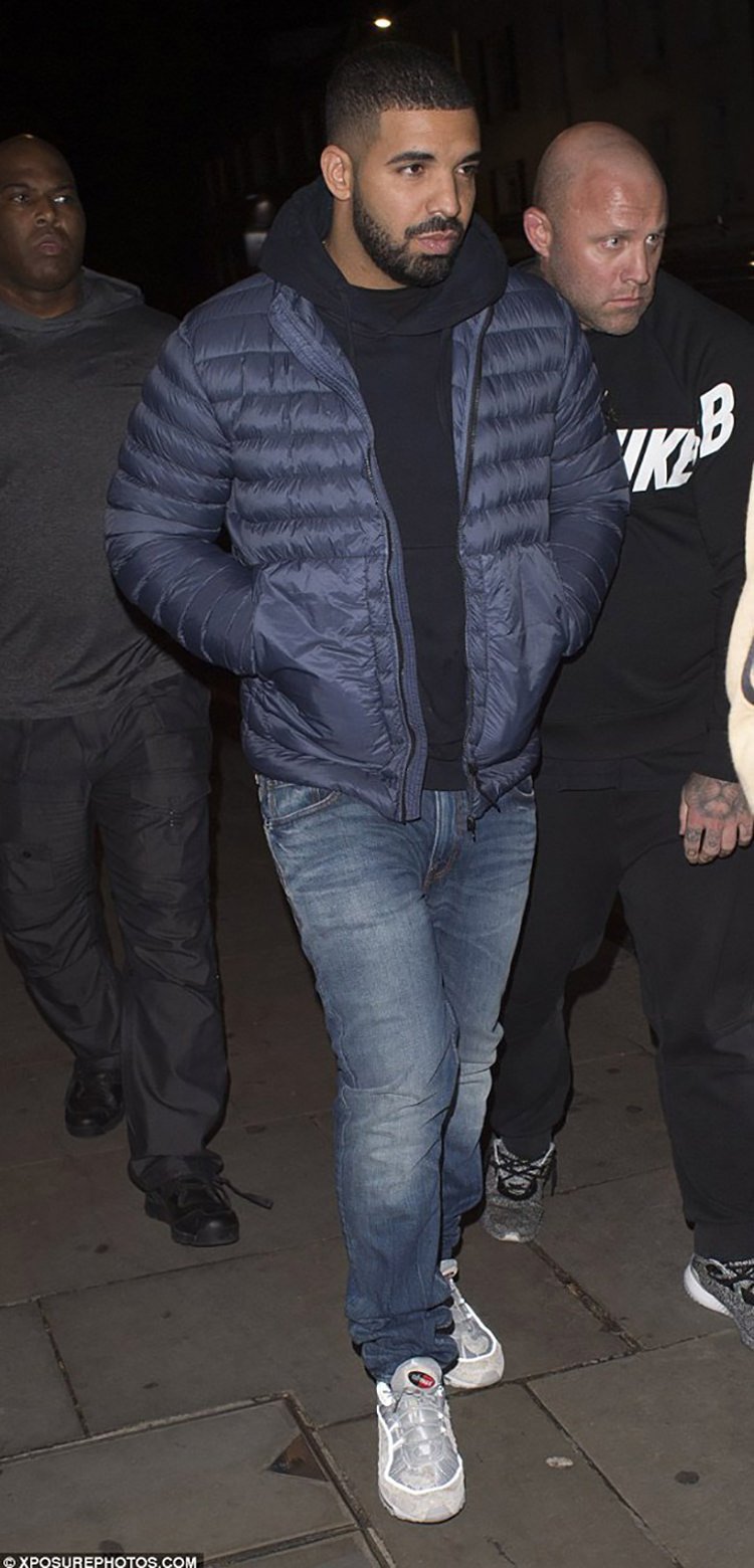 Drake gears up for the cold in a Stone Island down jacket and the Supreme x Nike Air Max 98.
