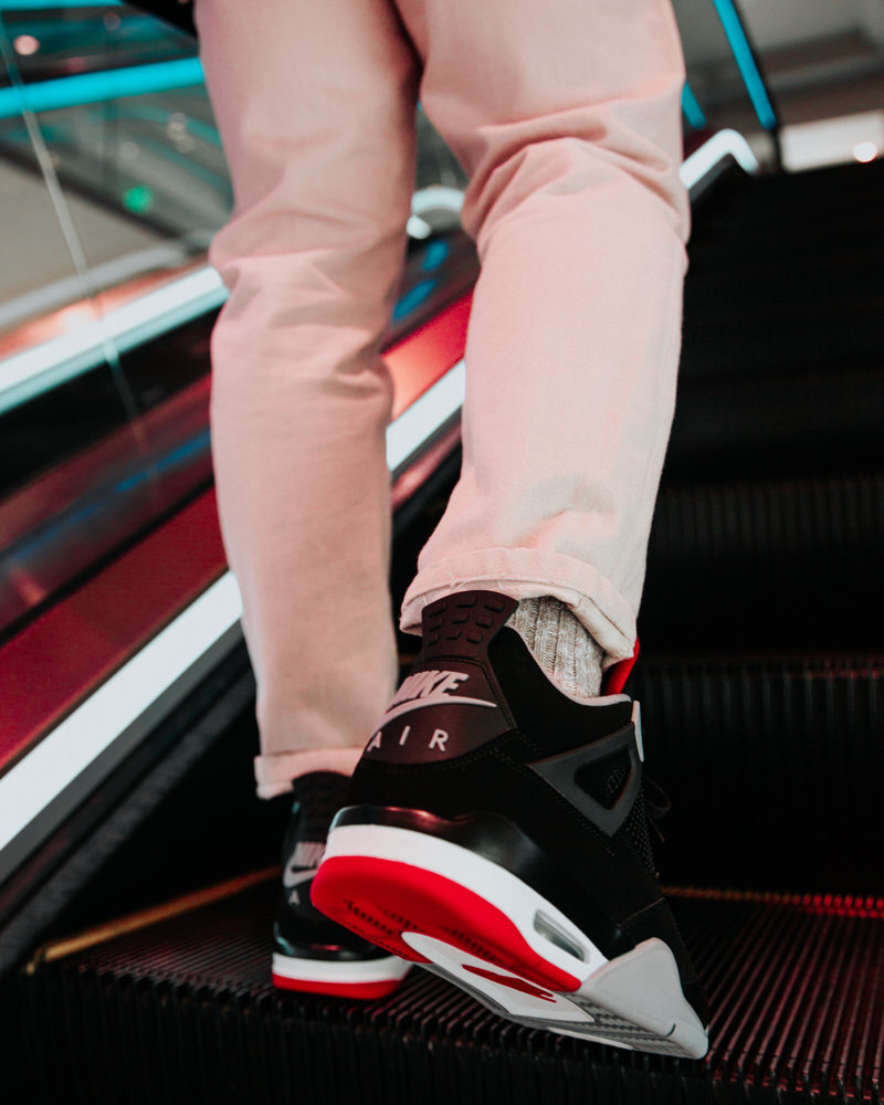 Here's How the 2019 Air Jordan 4 Black/Red Looks On Foot | Nice Kicks